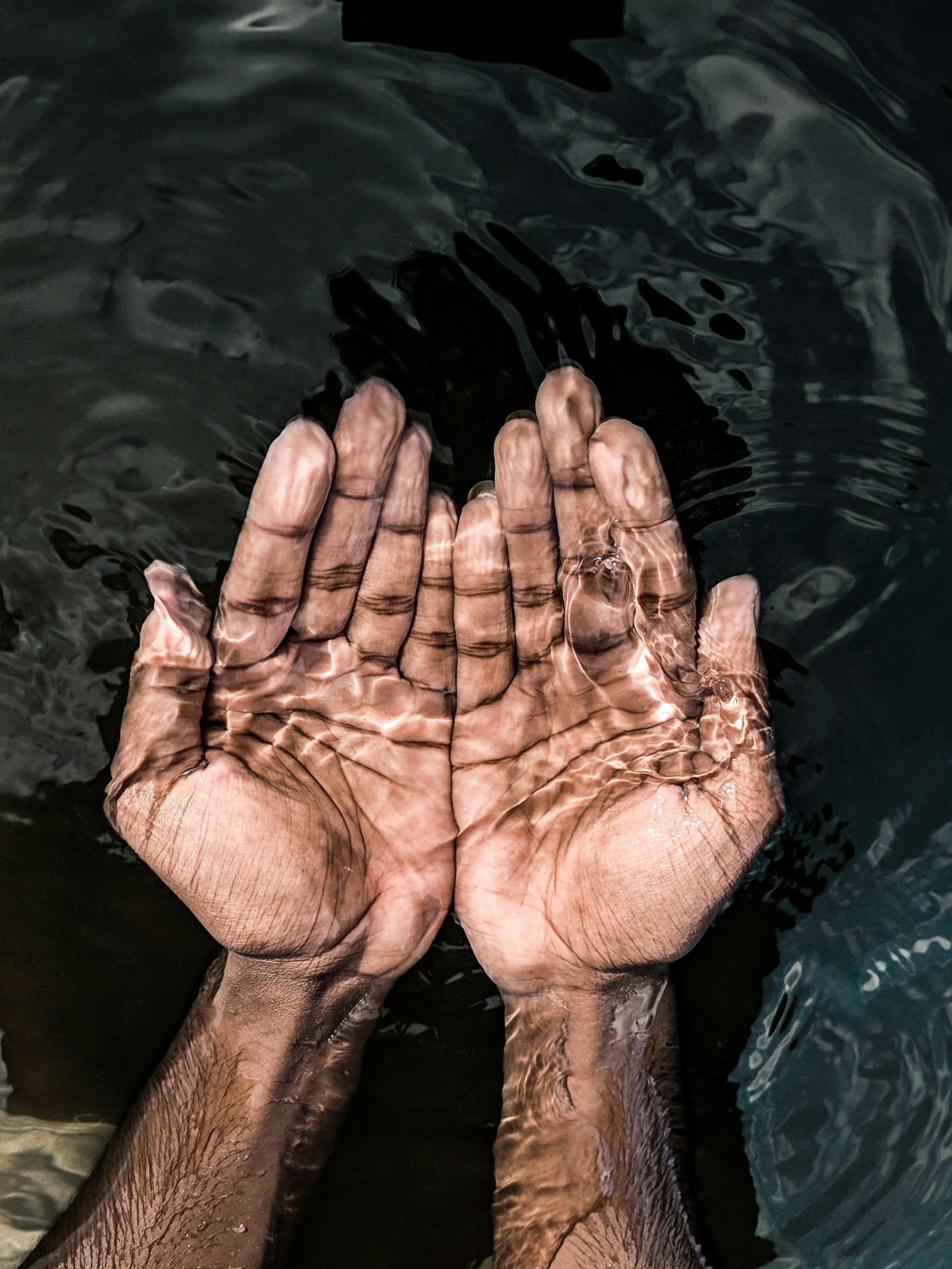 Hands in clean water